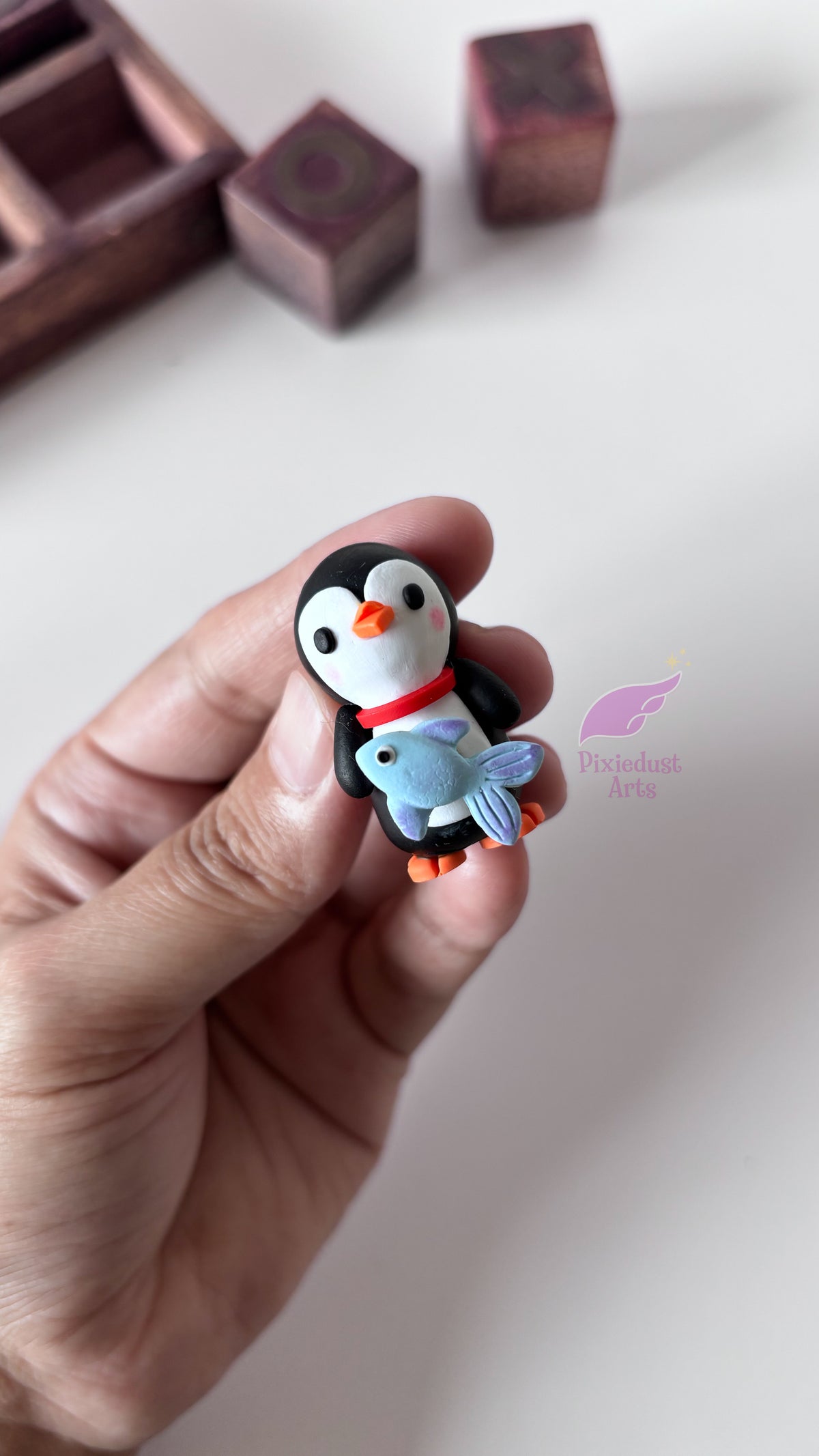 Penguin Buddy with Spinning Fish